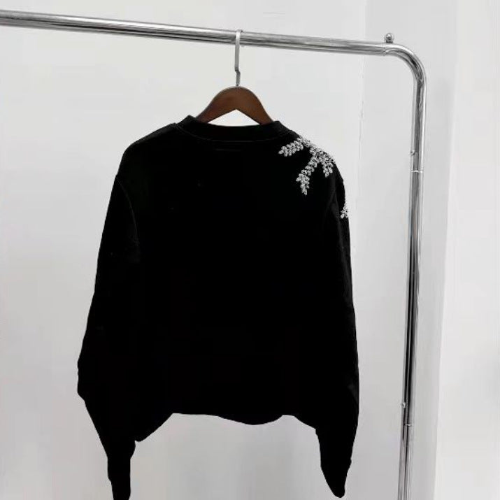 Women's black embroidered sweater