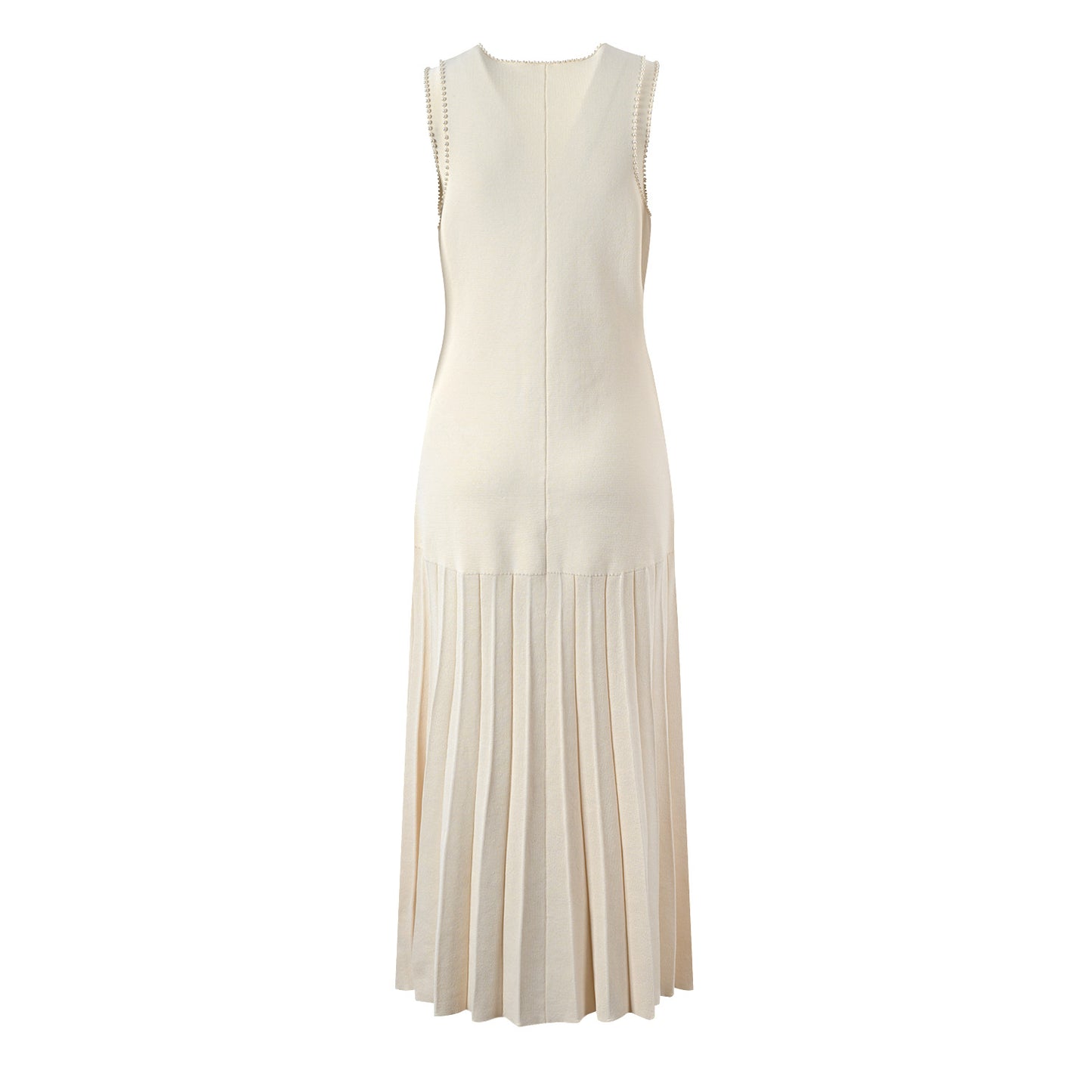 A woman's beige cardigan paired with a slim-fitting knitted dress