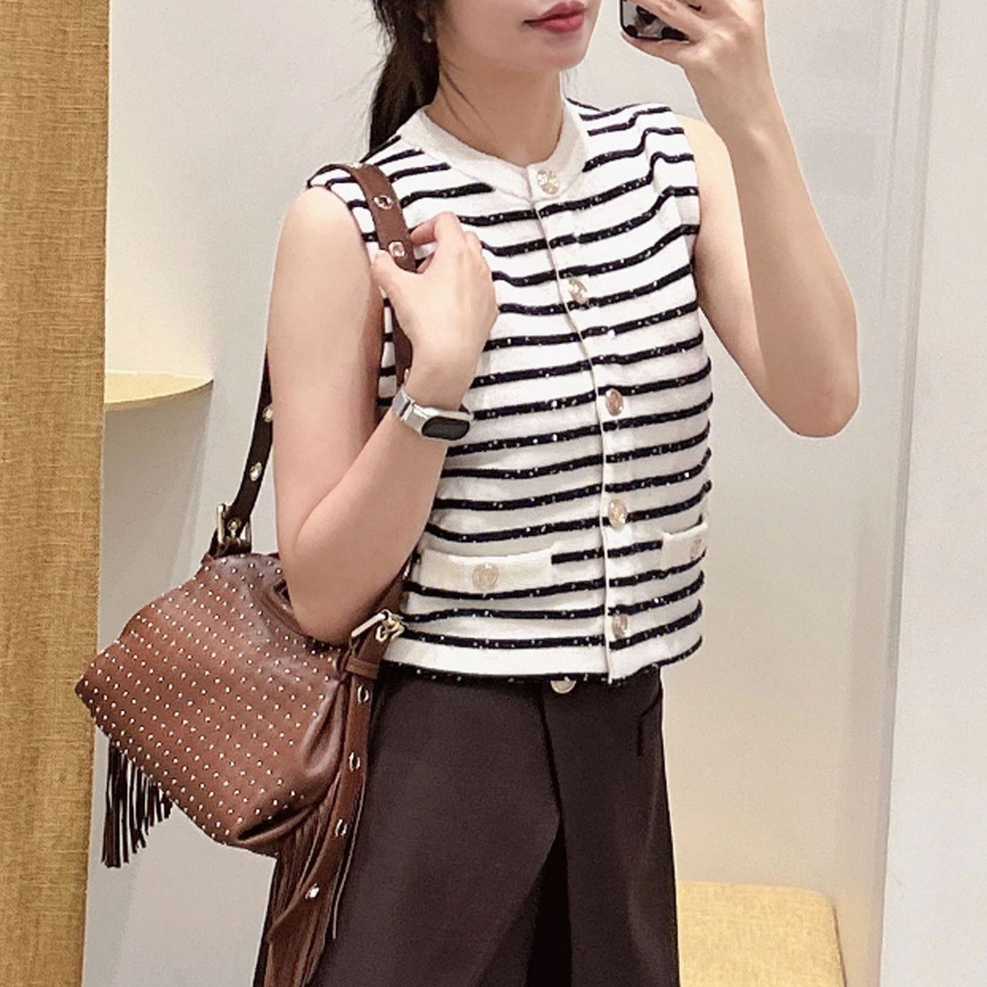 Sleeveless striped slim-fit knitted cardigan