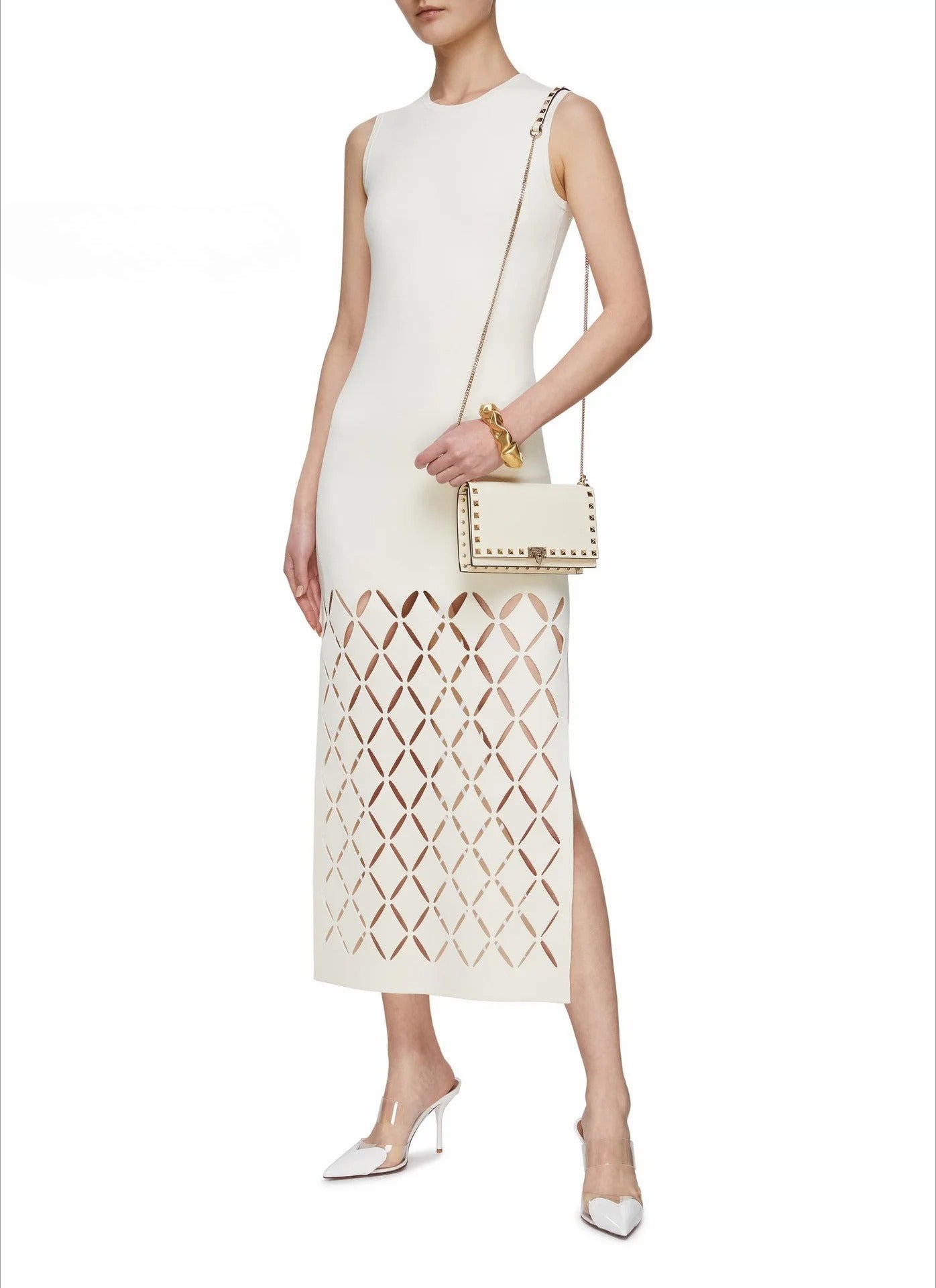 Two piece set of elegant hollowed out cardigan and dress for women