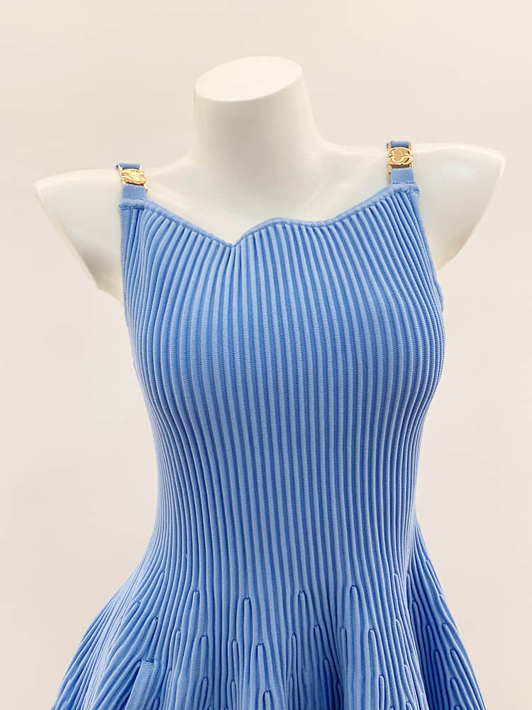 Women's blue suspender dress