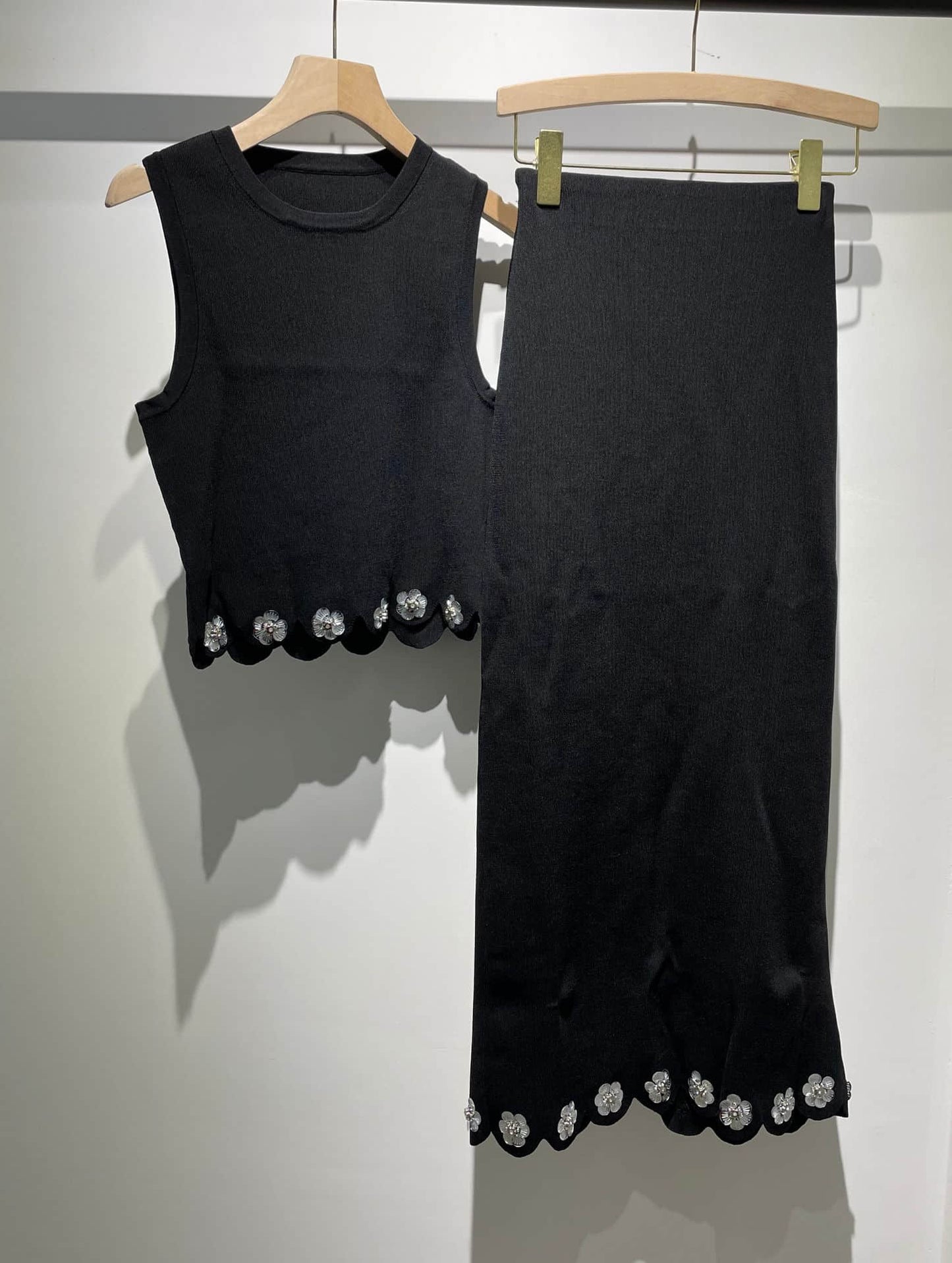 Women's black cardigan or skirt two-piece suit