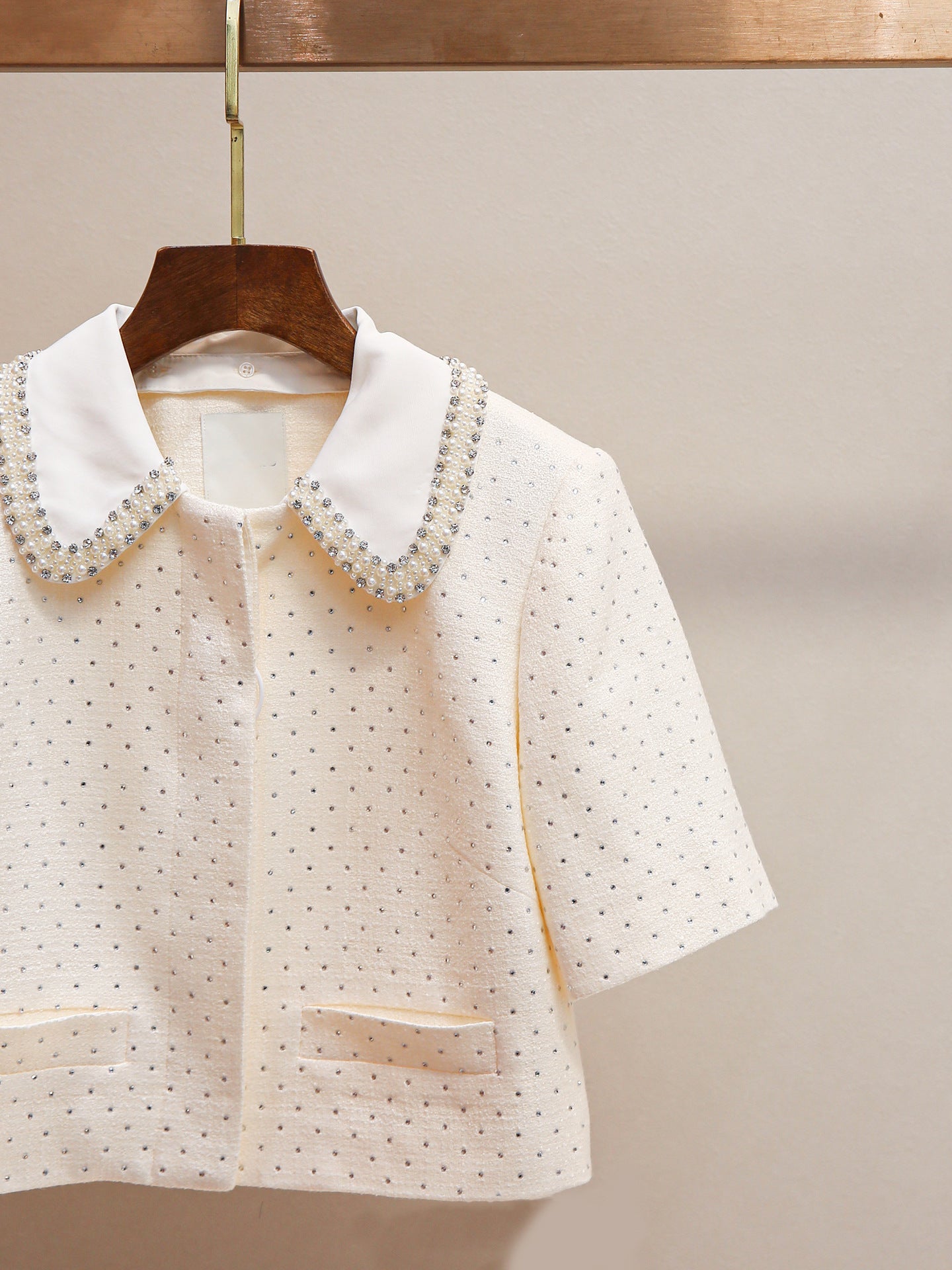 Women's elegant two-piece set: shorts and top or stylish trousers