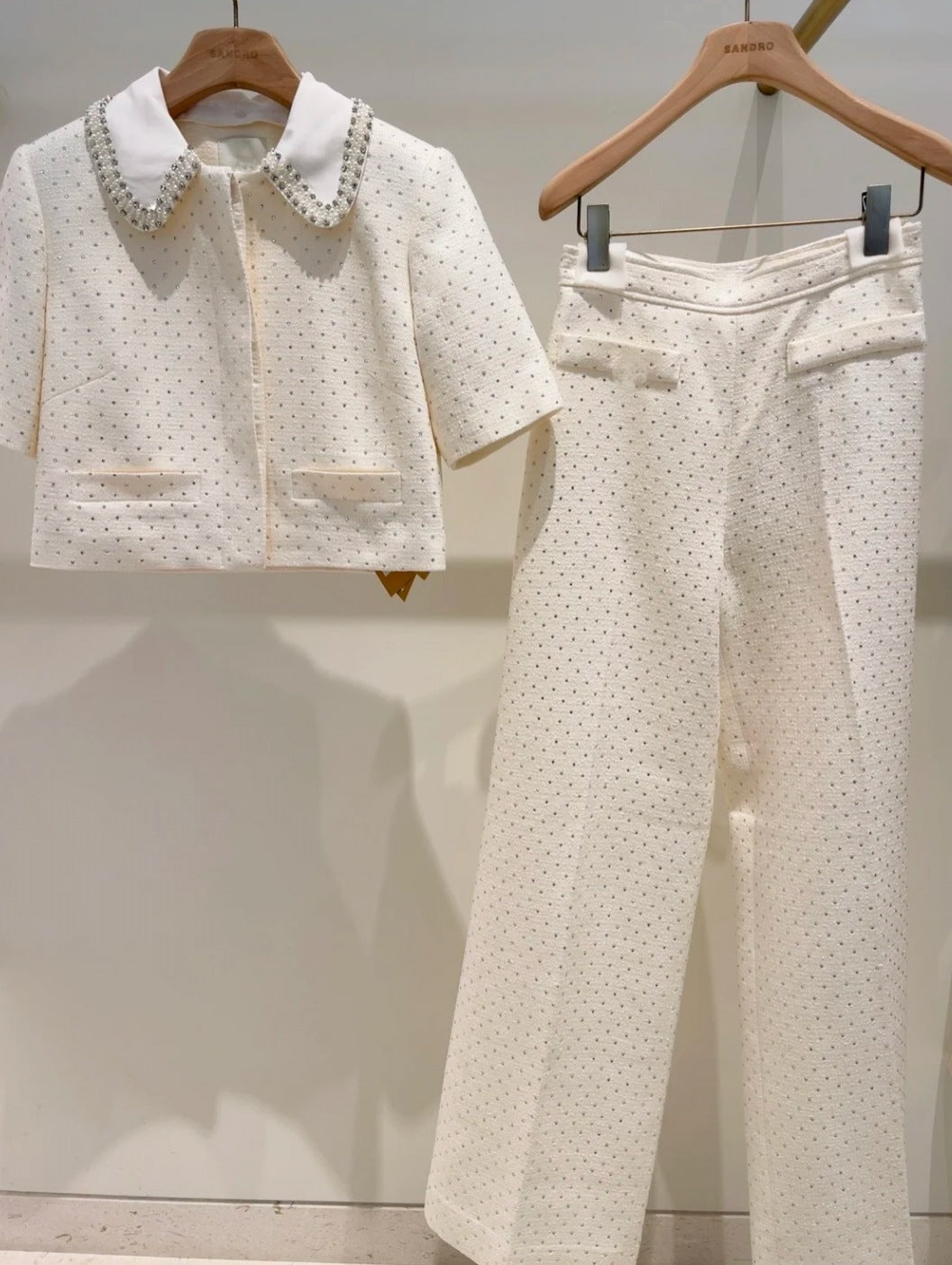 Women's elegant two-piece set: shorts and top or stylish trousers