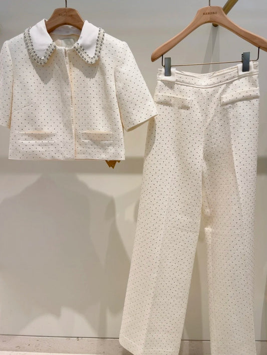 Women's elegant two-piece set: shorts and top or stylish trousers