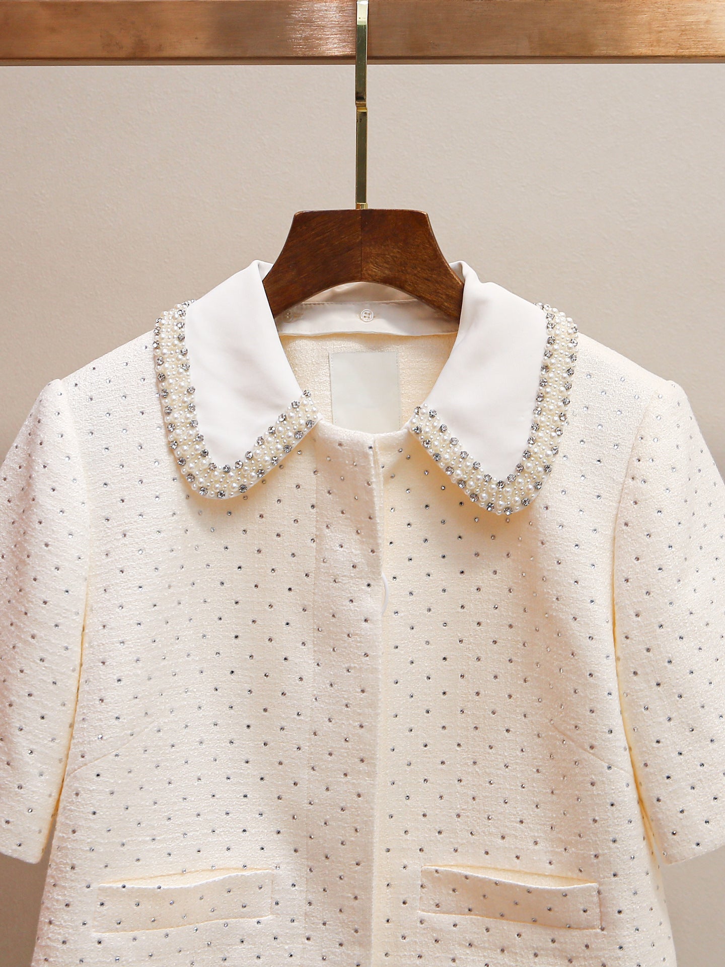 Women's elegant two-piece set: shorts and top or stylish trousers