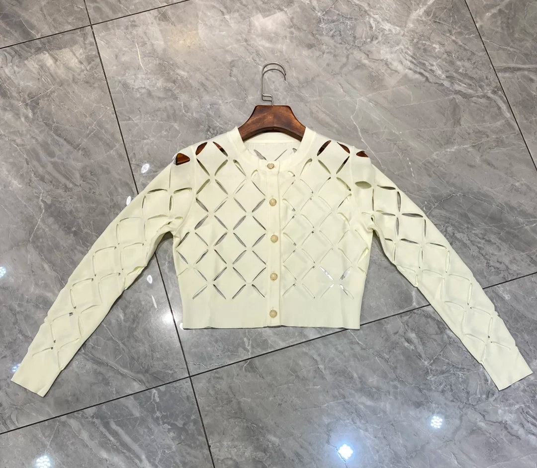 Two piece set of elegant hollowed out cardigan and dress for women