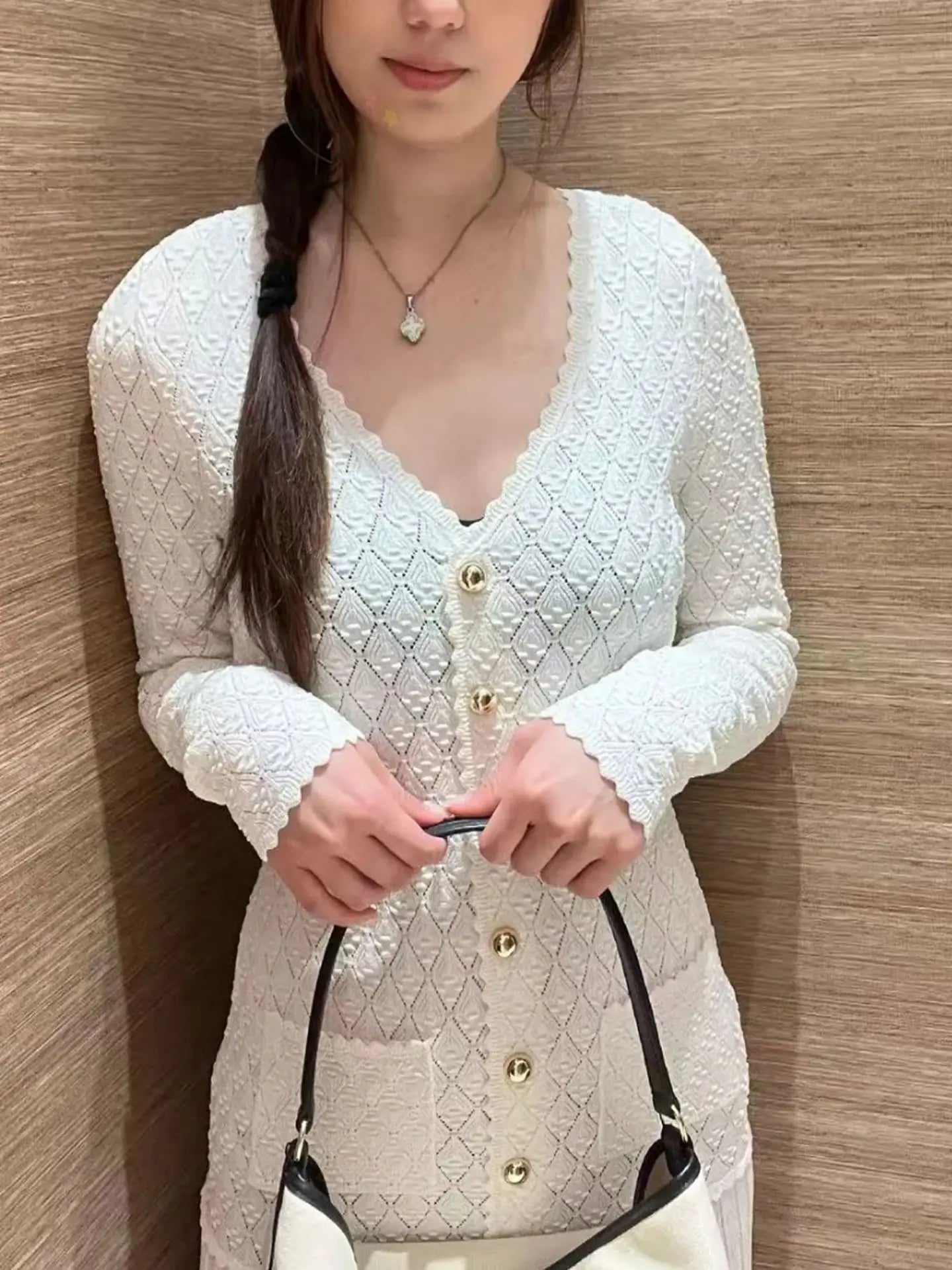 Women's white V-neck knitted dress