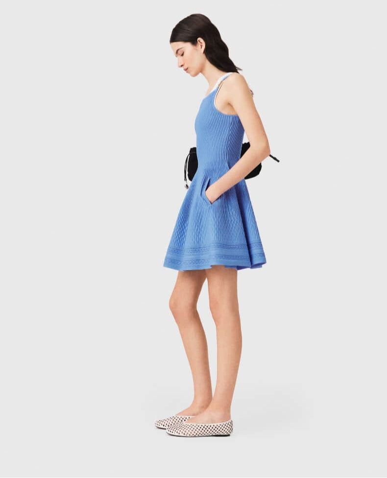 Women's blue suspender dress