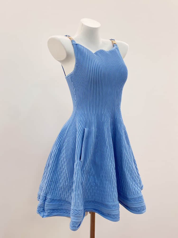 Women's blue suspender dress