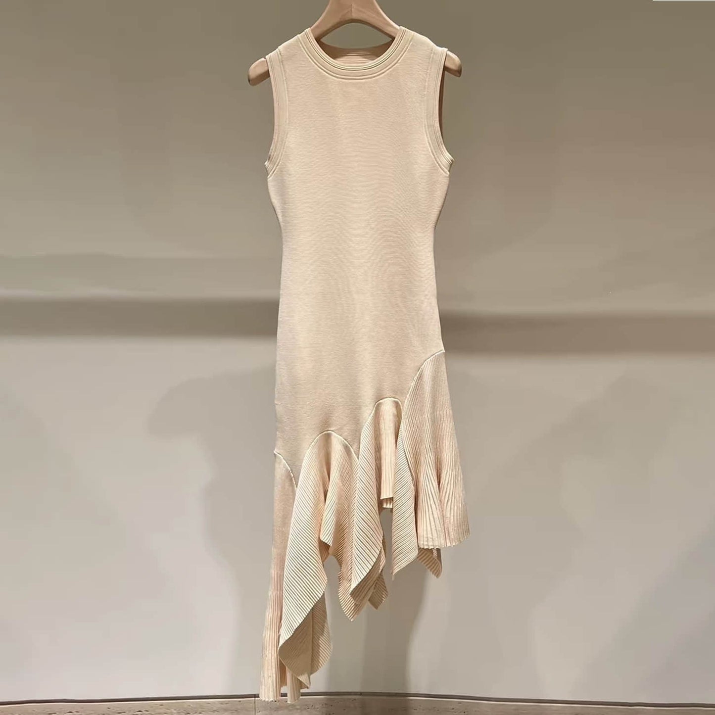 Asymmetrical crew neck knitted dress