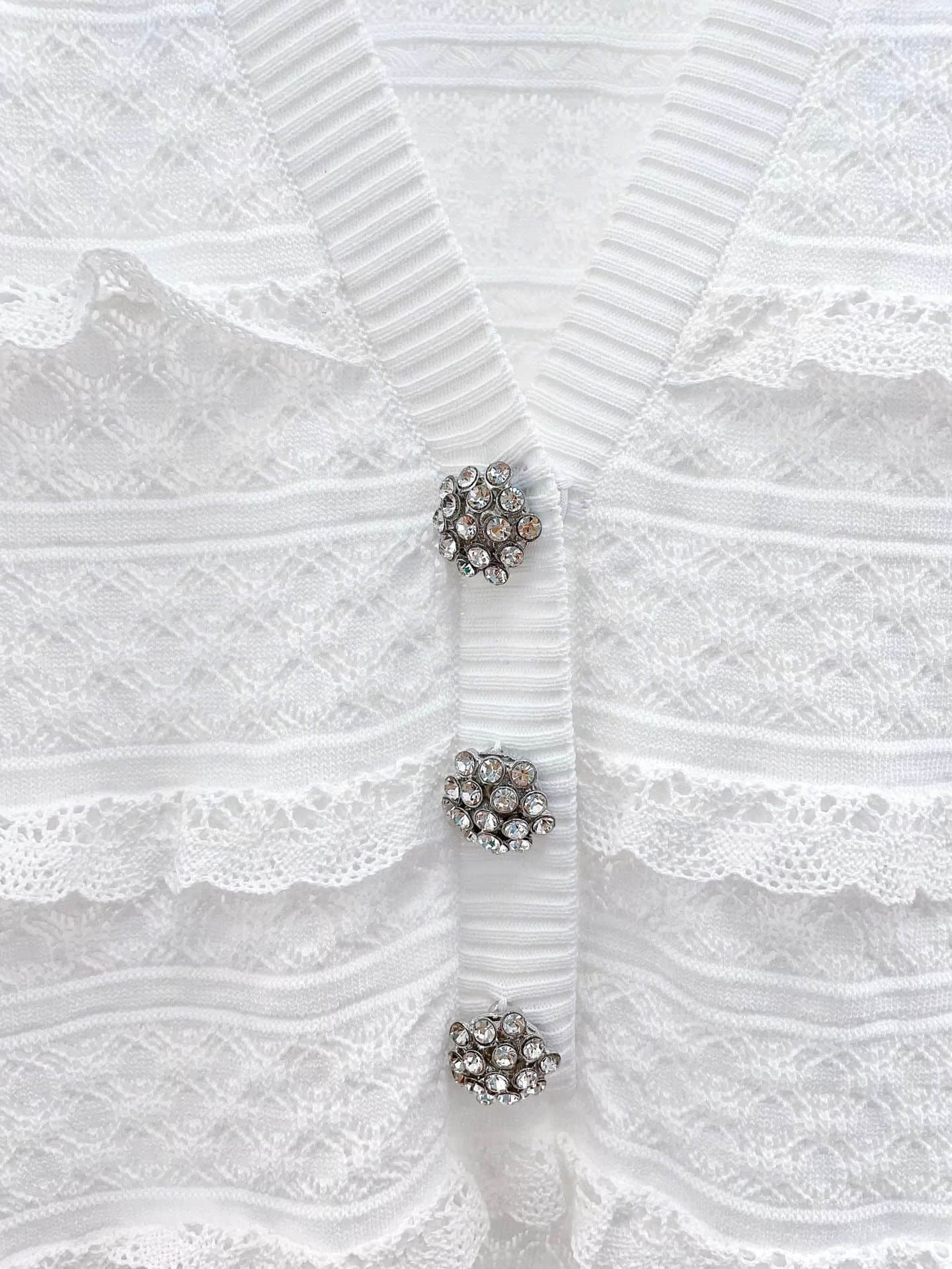 White V-neck long-sleeved knitted dress