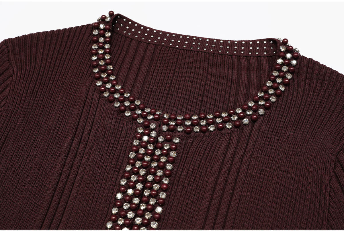 Two women‘s long-sleeved diamond-stitched knit suits